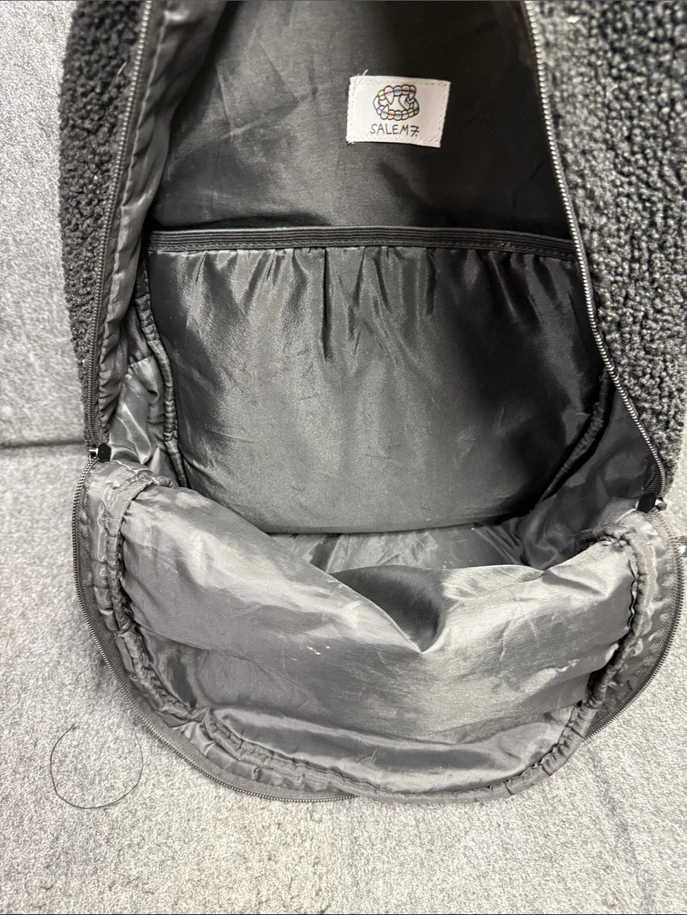 Salem 7 Black Sherpa Backpack with Salem Embroidered Design